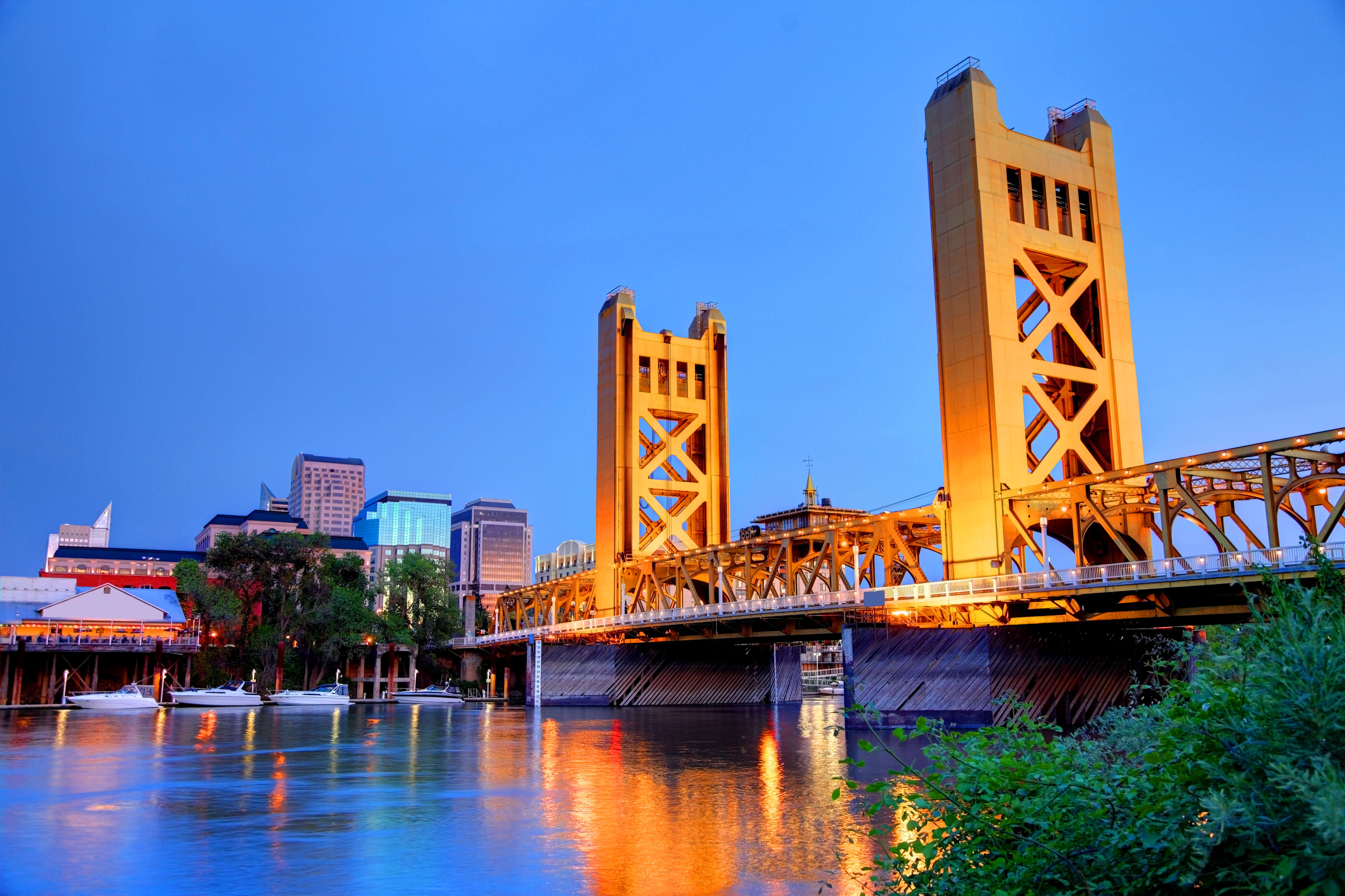 Sacramento Bridge over blue water. 